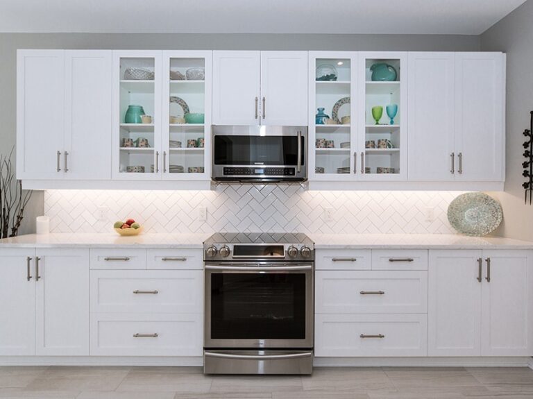 herringbone pattern tile backsplash