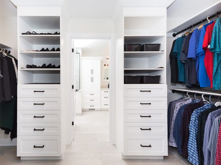 custom walk-in closet leading to bathroom