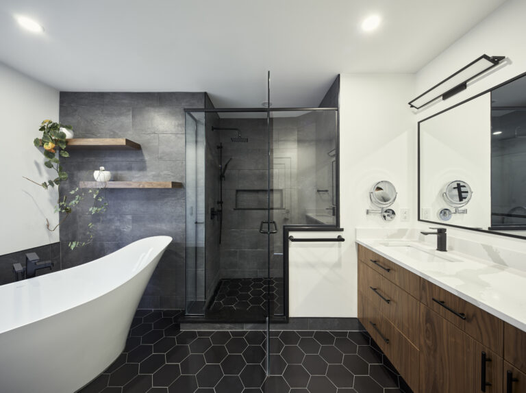 modern bathroom renovation with freestanding tub and glass shower